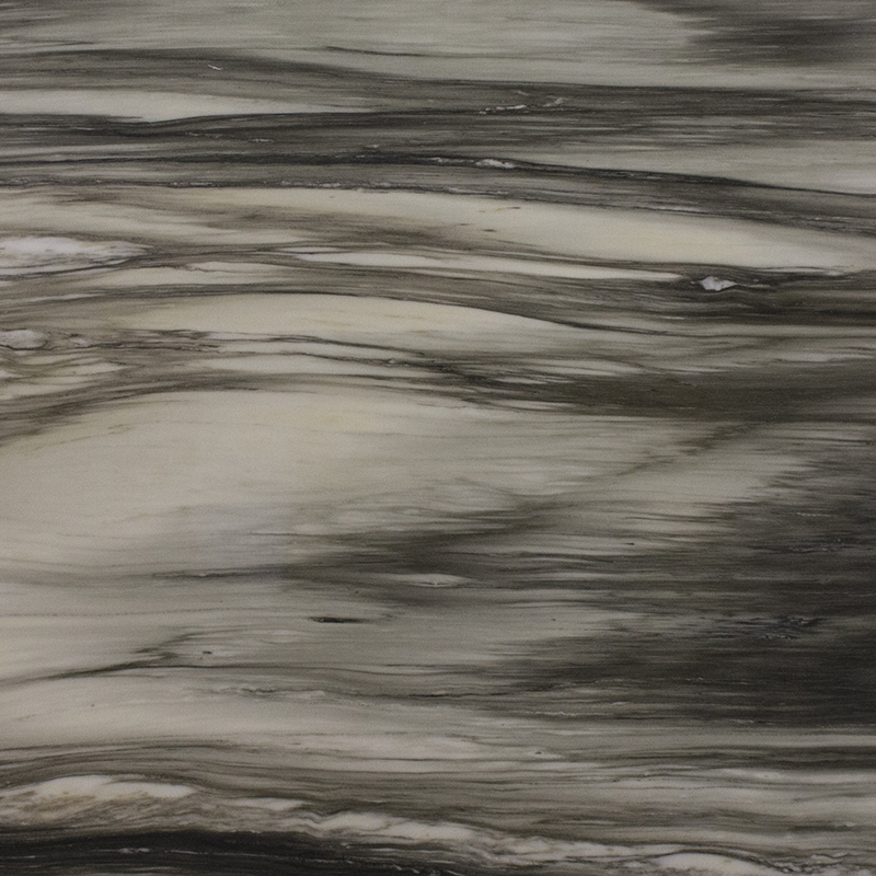 Close-up of a polished stone surface with swirling gray, black, and white patterns, resembling natural marble. No text visible.