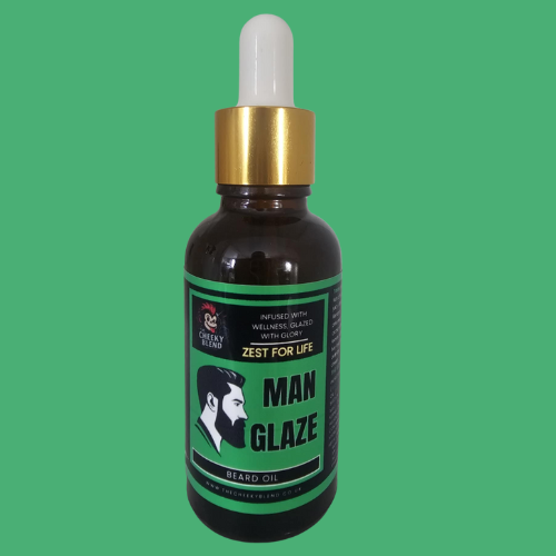 Amber dropper bottle of Man Glaze beard oil in the scent 'Zest For Life' with a bold green label, featuring The Cheeky Blend