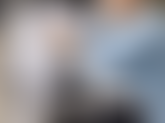 woman taking laundry from dryer