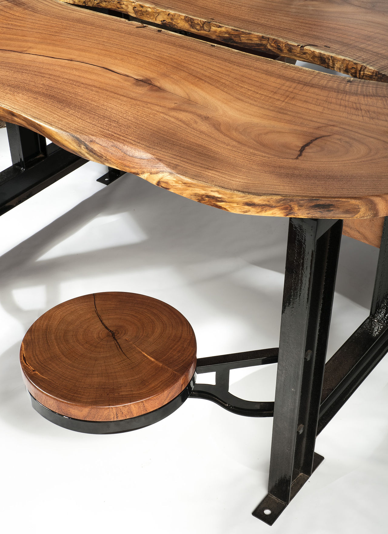 industrial steel dining table with wood slab table top and seats