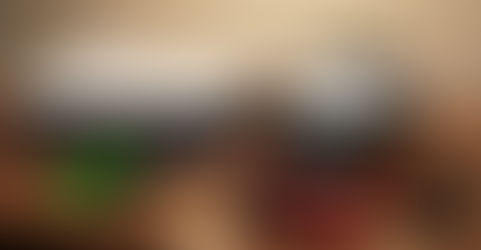 PS5 console with a PSVR headset, PSVR camera, and controllers arranged together for a PSVR on PS5 setup.