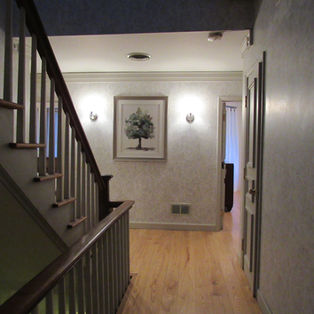 Interior hallway and stair landing at Washington Park Inn