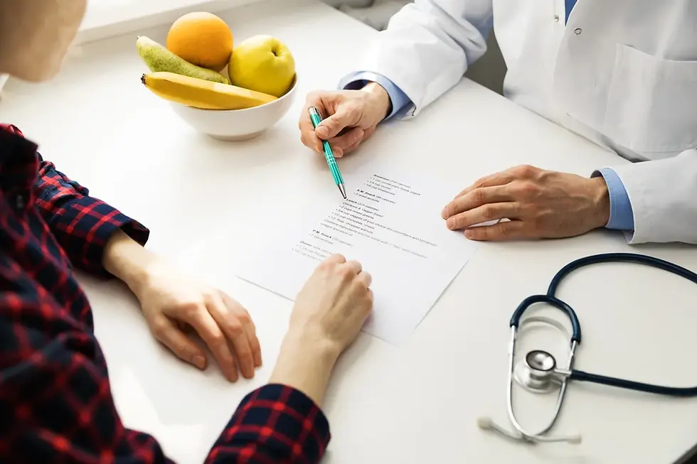 A patient and doctor discuss a document, surrounded by fruits and a stethoscope, emphasizing health and nutrition.