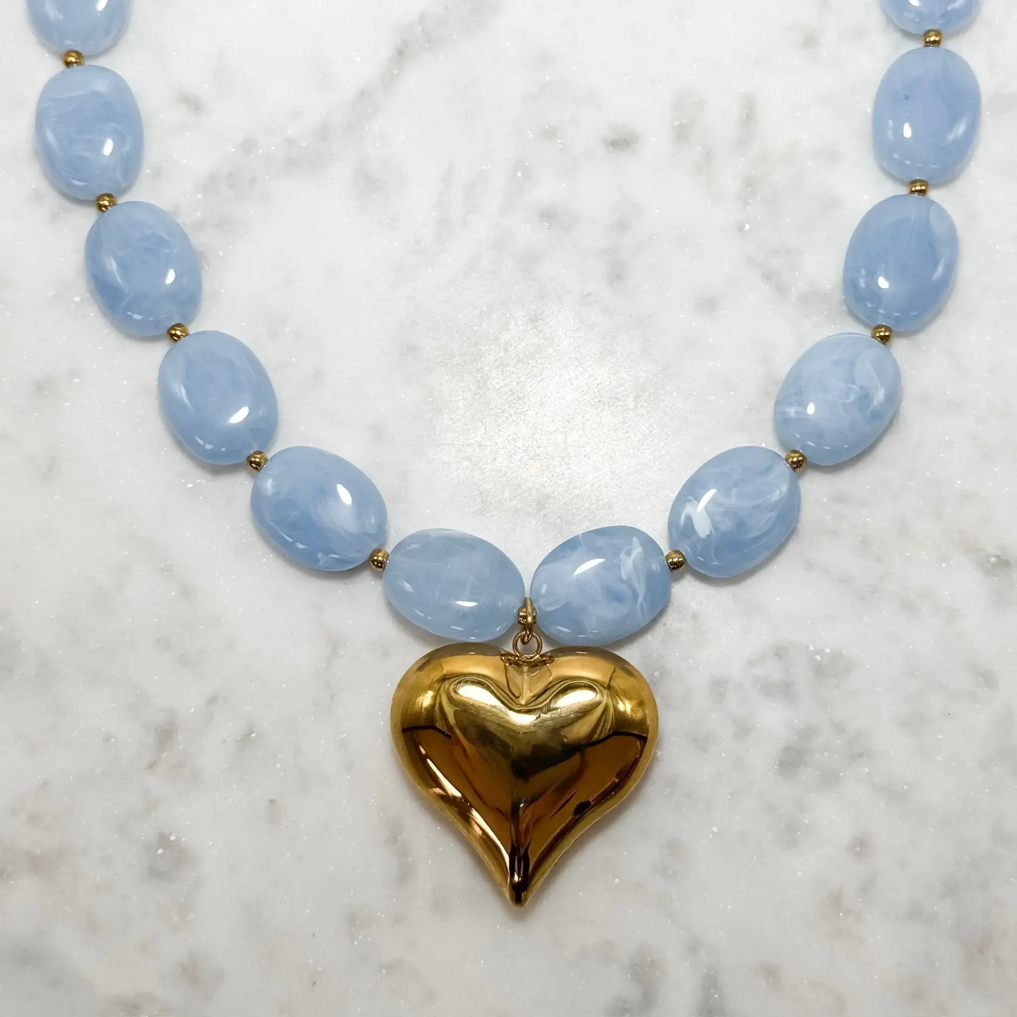 Blauwe kralen ketting met hart