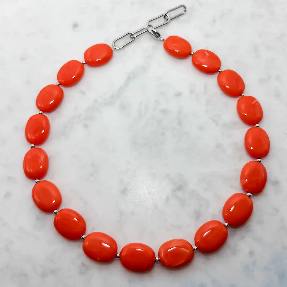 Thumbnail: Oranje kralen ketting