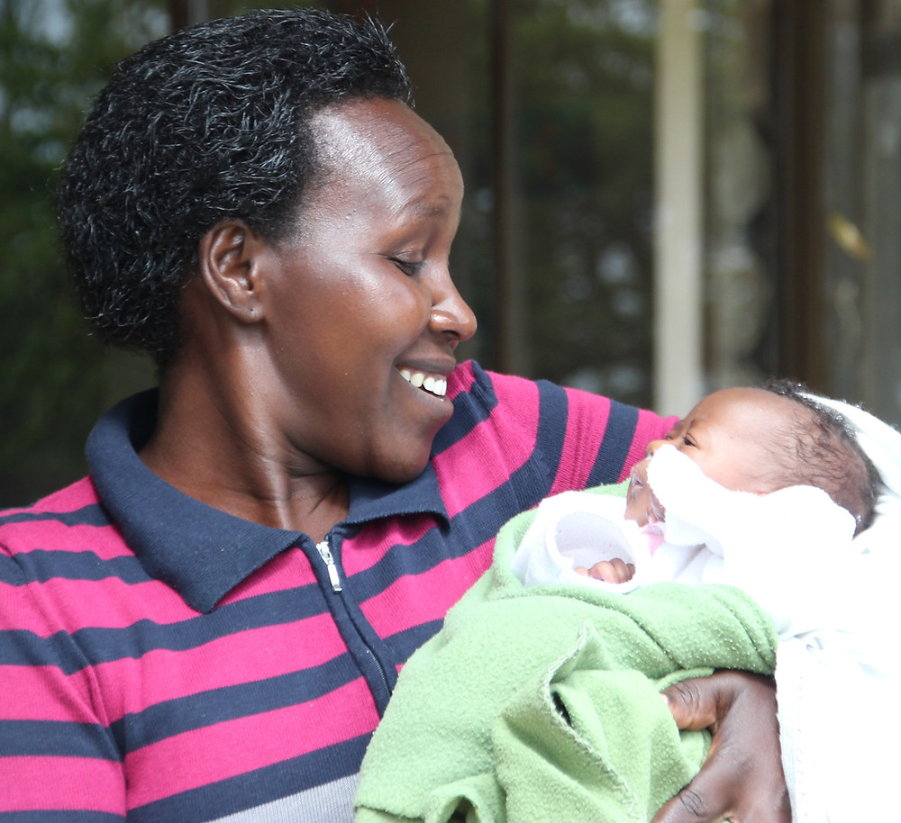 Woman holding child