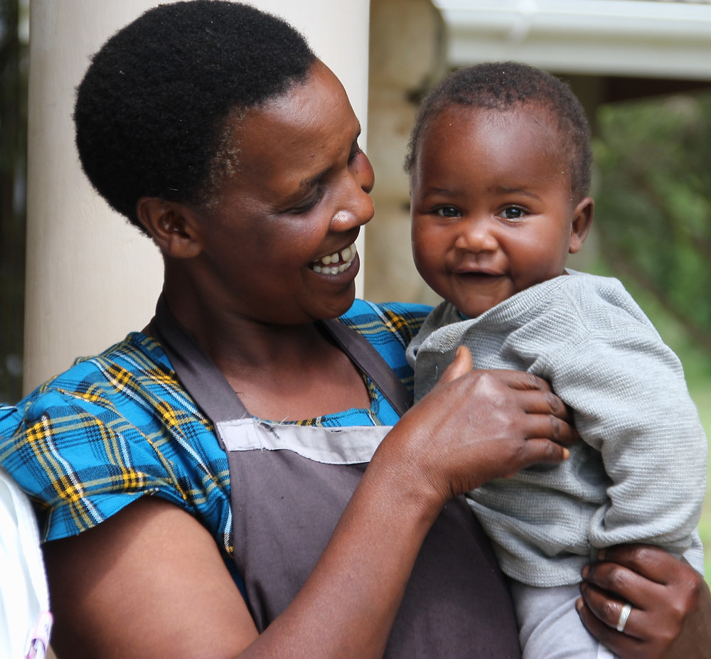 Woman holding child