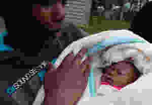 woman holding baby
