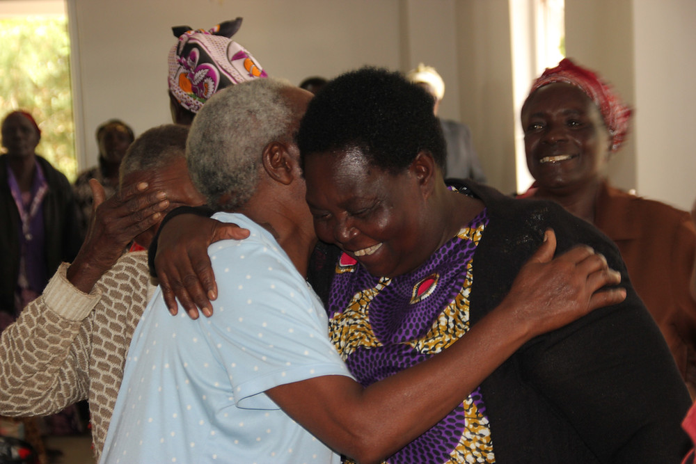 elders hugging