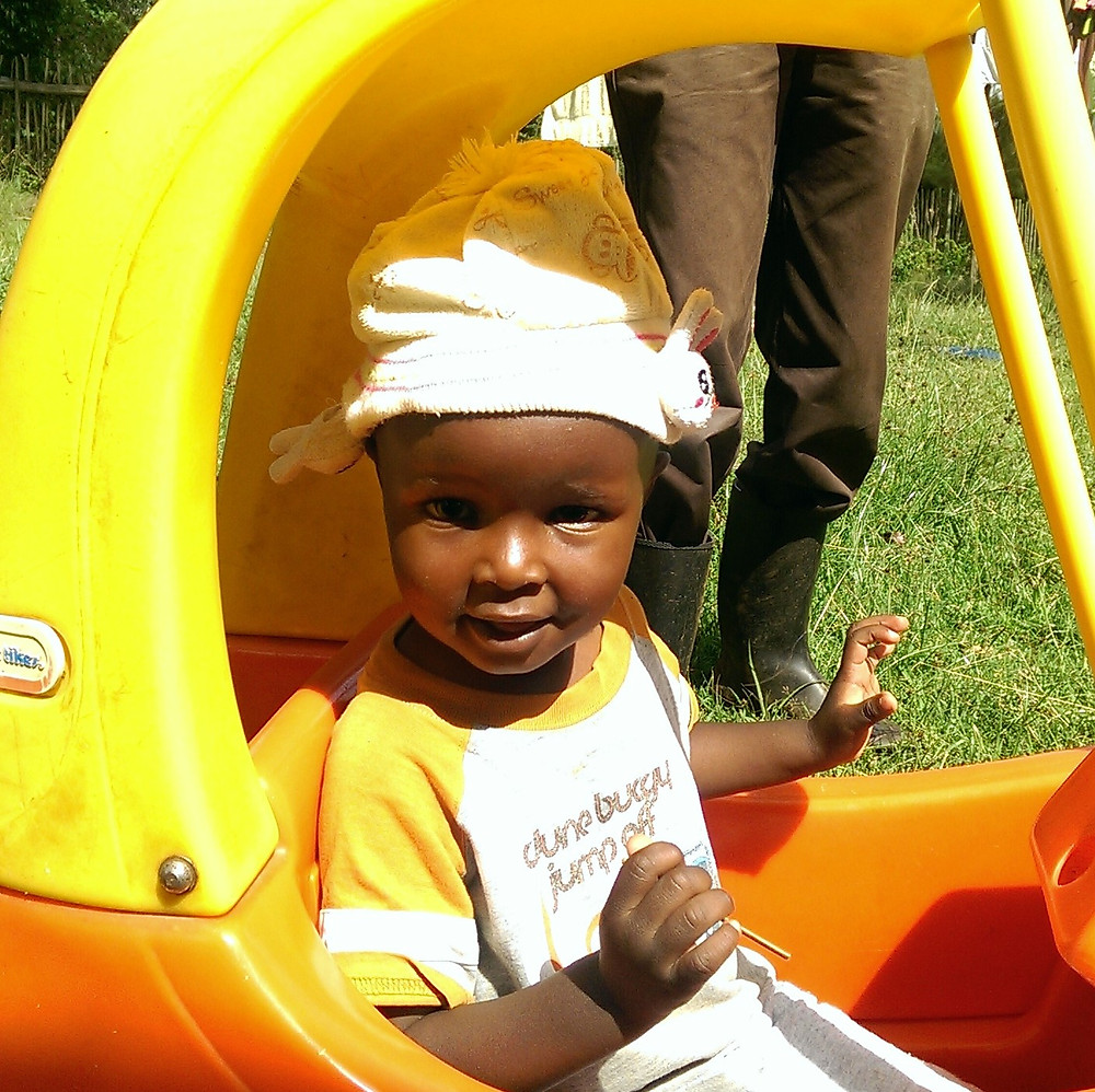 Peter in toy car
