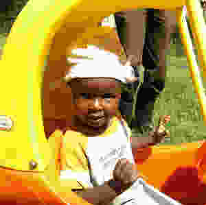 Peter in toy car