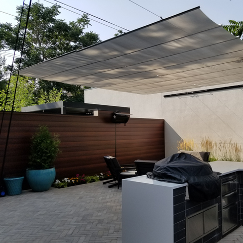 Durable slide-on-wire shade panels, offering UV protection and weather resistance for residential or commercial outdoor spaces