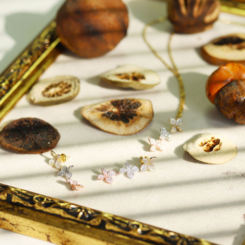Sparkling gemmed flower jewelry.