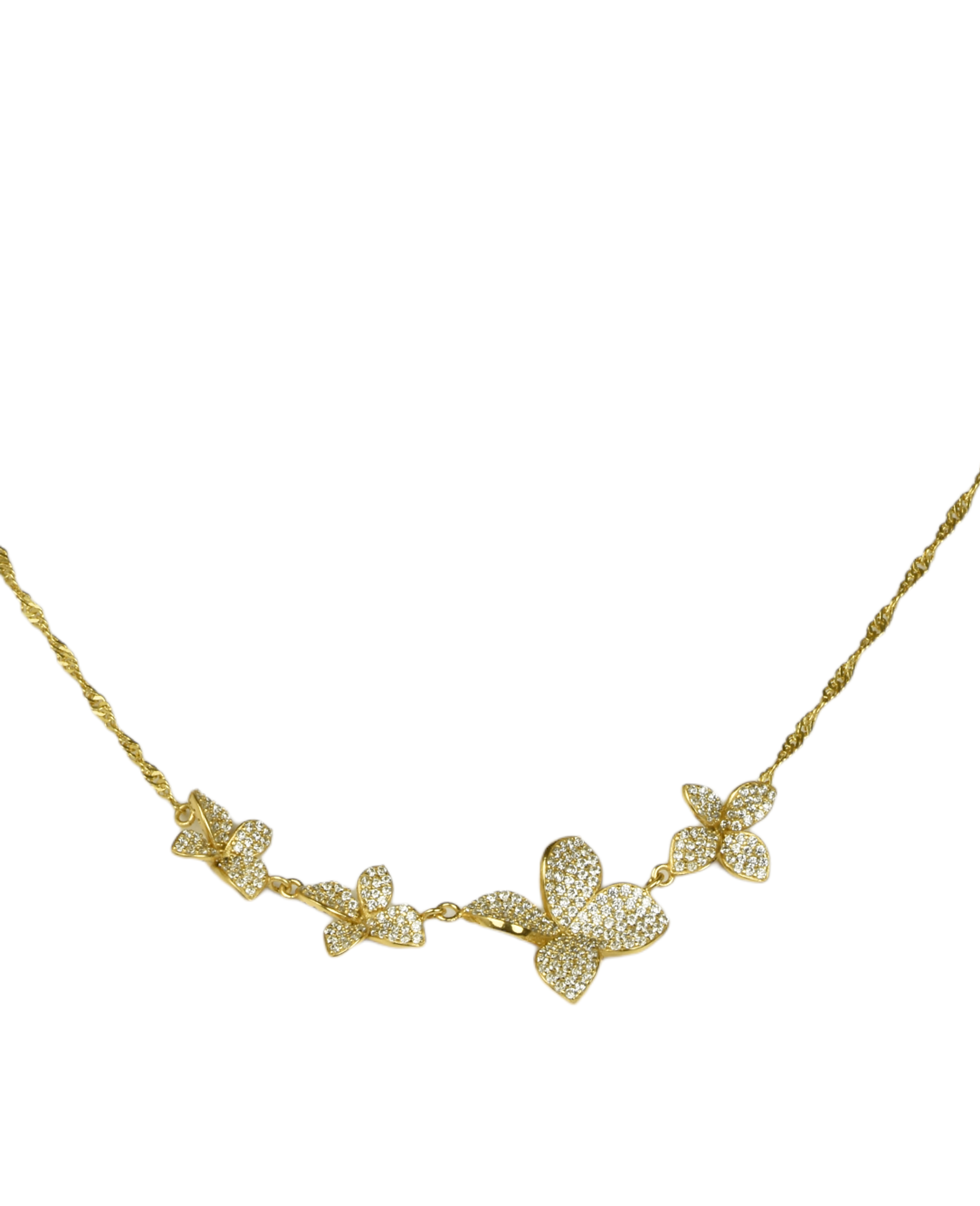 Angled view of gold three-flower pavé station necklace showing flower detail and adjustable clasp
