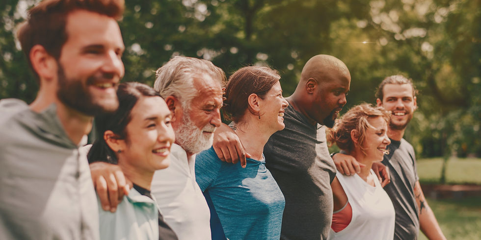 Diverse group of people outdoors smiling and bonding. Friends enjoying nature showing unit