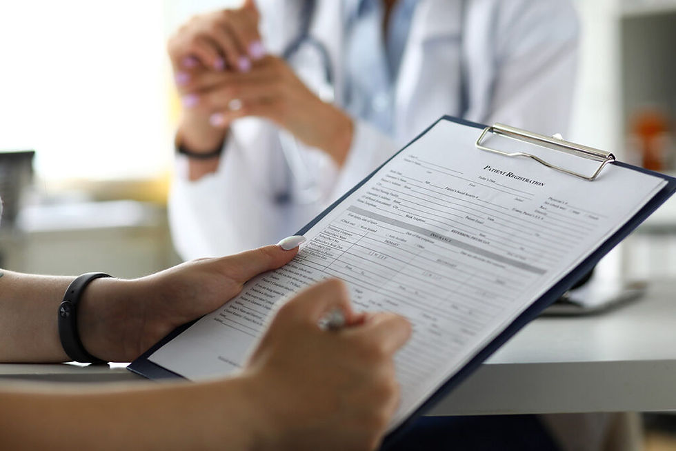Close-up view of a calendar with marked postpartum checkup dates