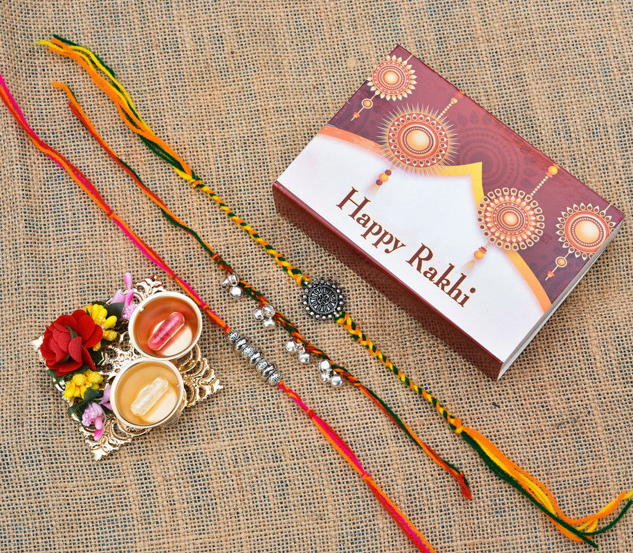 Oxidized silver thread rakhi with minimalist design