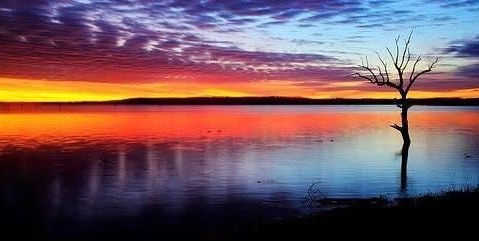 The tranquil sunsets of Lake Kariba belie the danger of the storms that occur there. - Photo uncredited