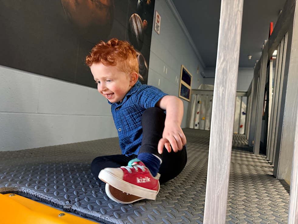 autistic boy playing at ABA therapy
