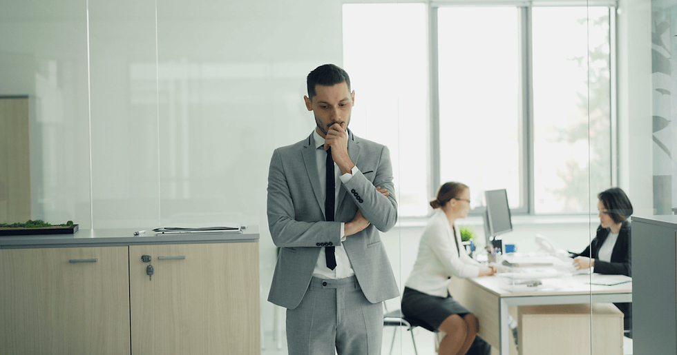 Young professional man waiting nervously for job interview representing career switcher stage choosing Zoho CRM training