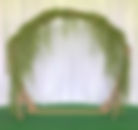 stick arch with greenery.jpeg