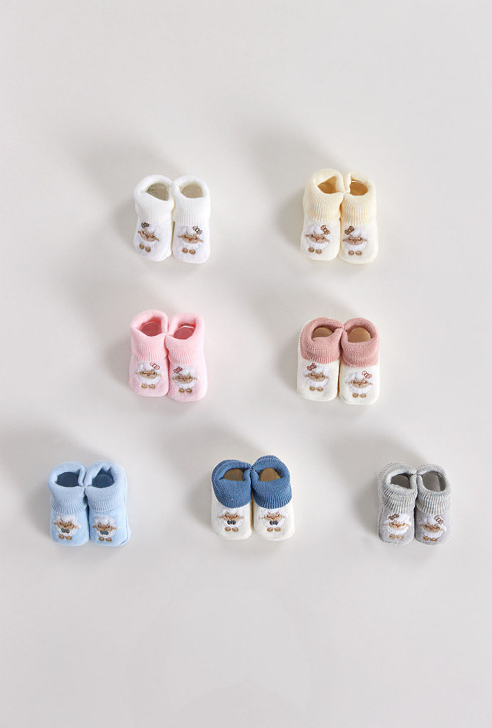 Thumbnail: Embroidered sheep baby booties Small Baby Hamper – Eco-Friendly Baby Gift Box with Rompers, Bib, and Towel