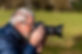 A photographer capturing the beauty of Devon's landscapes, highlighting the opportunities for photography training and workshops in the region