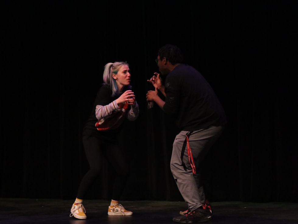 Seth Miller (Right) and Caroline Herrick (Left) performing an original scene