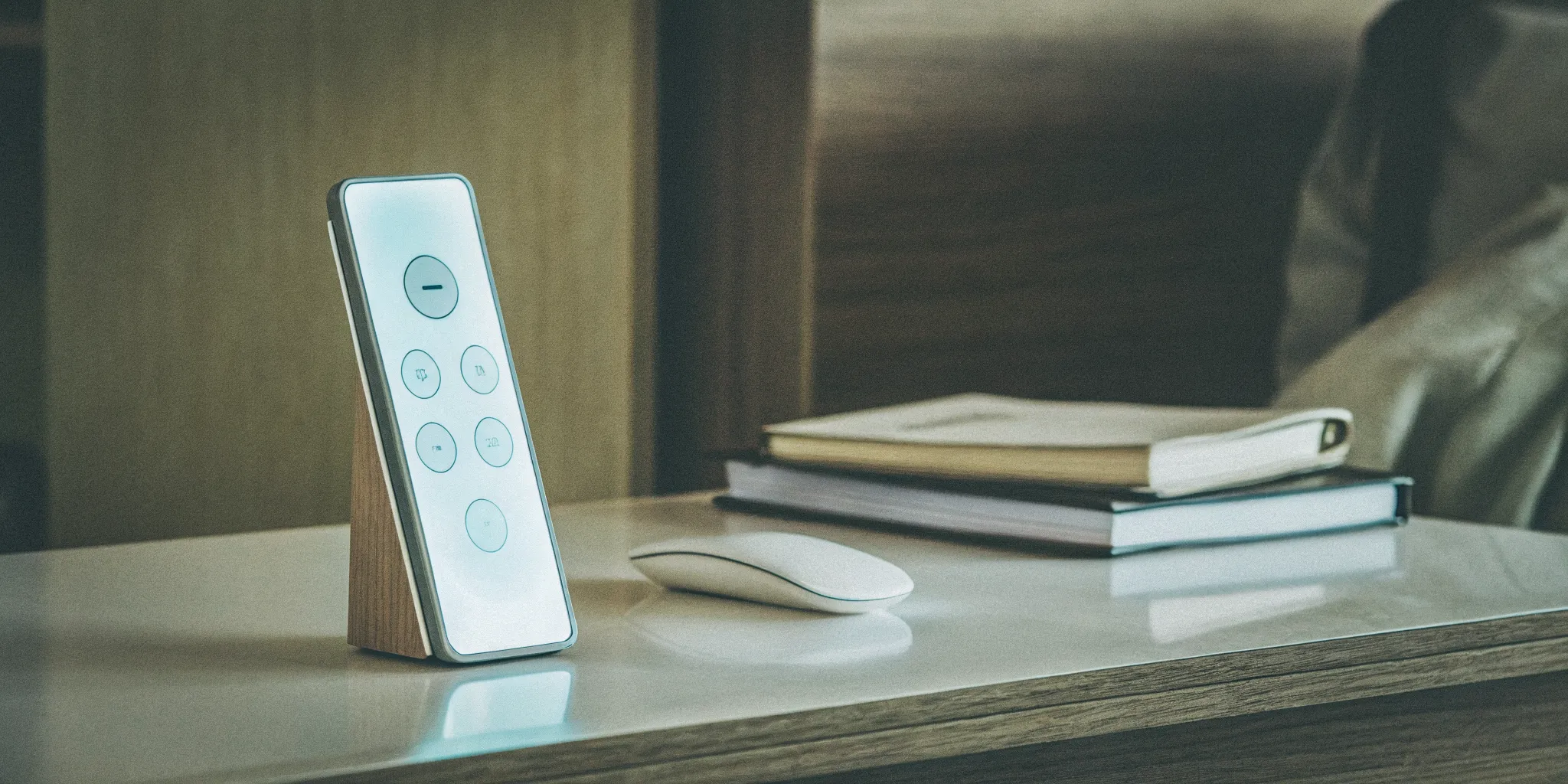 A patient-friendly hand-held controller for adjusting spinal cord stimulator settings on a doctor's desk