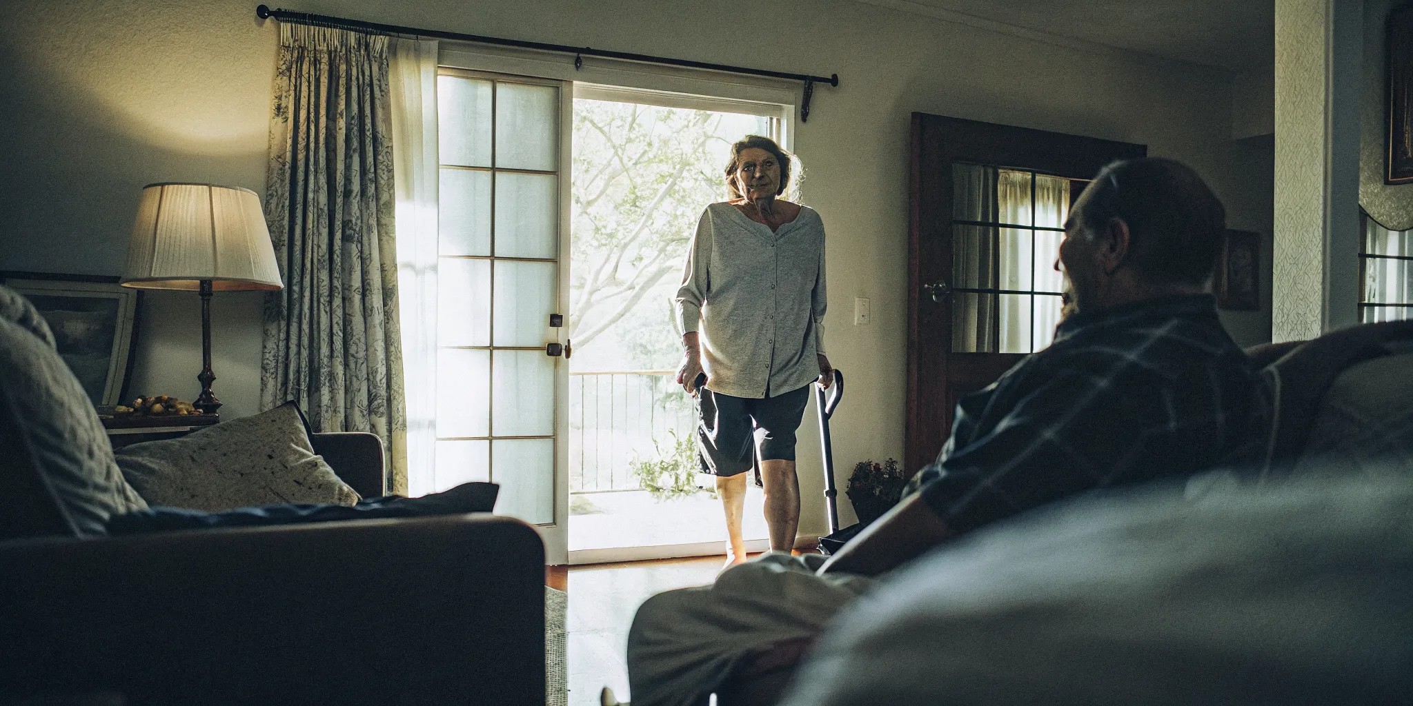 Patient taking a gentle walk at home during recovery after back pain ablation