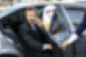 businessman-getting-out-of-luxury-car.jpg