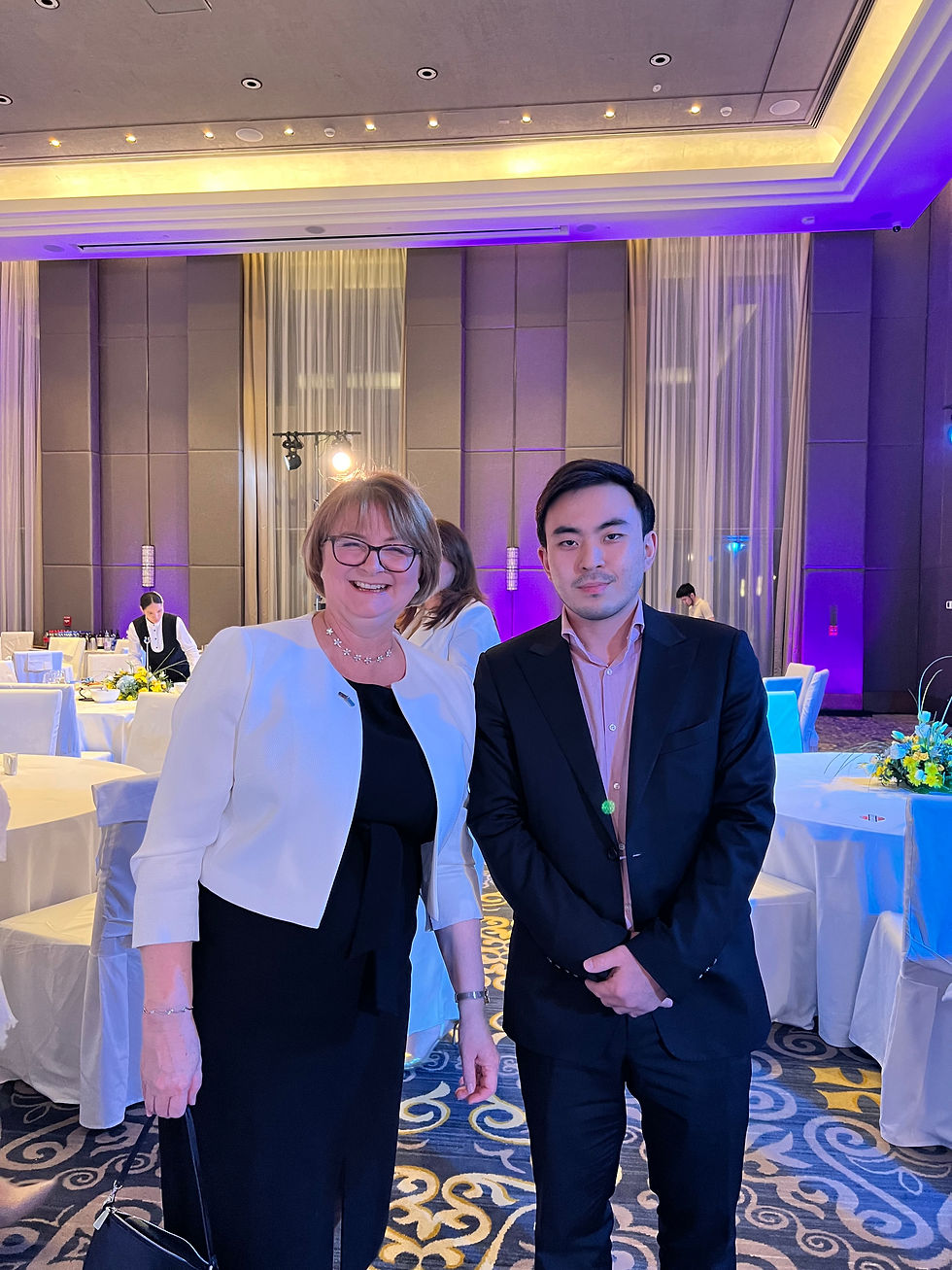 (L-R) HE Kathy Leach and Alizhan Askargaliyev