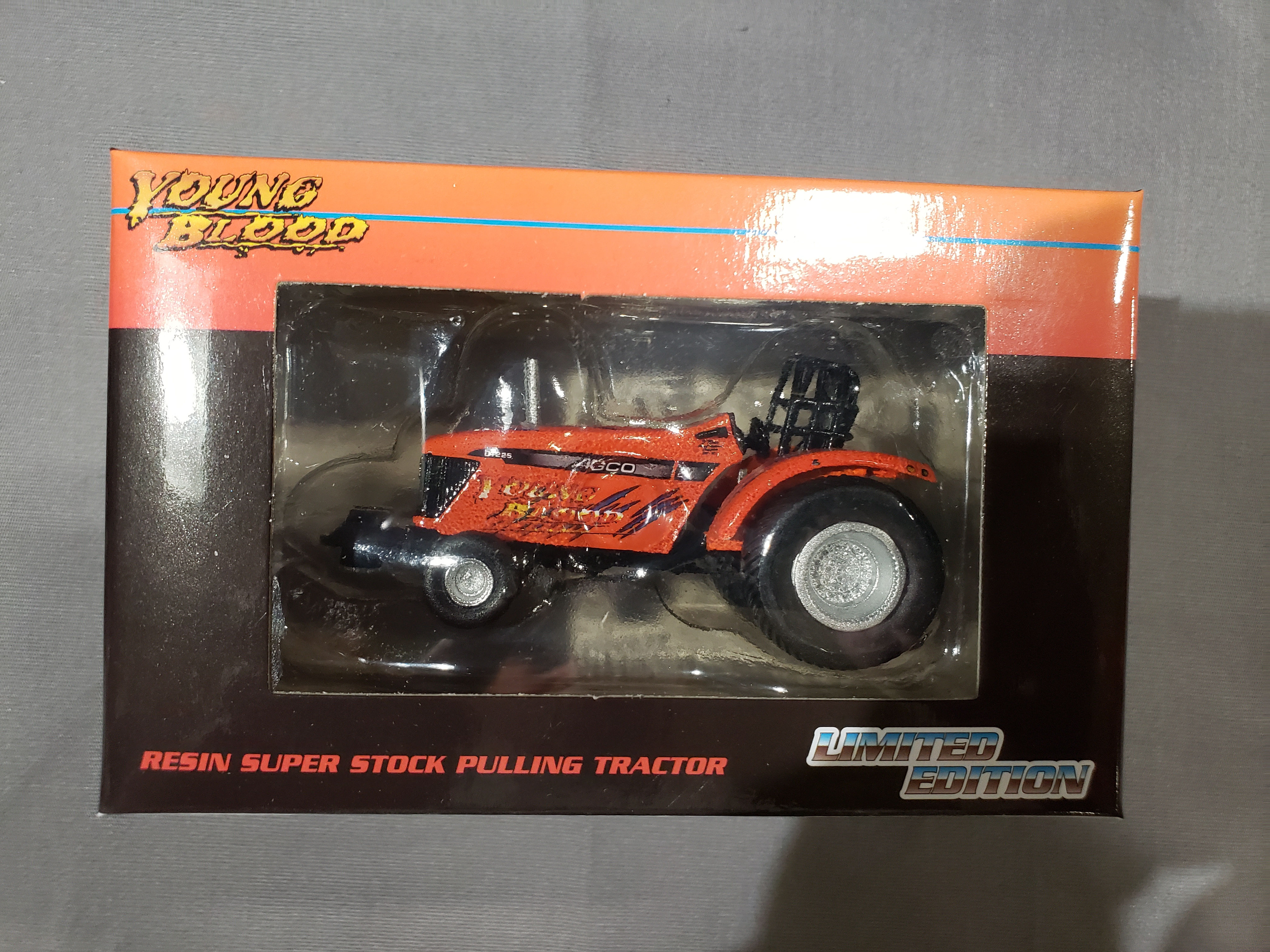 1/64 AGCO DT225 Young Blood Pulling Tractor