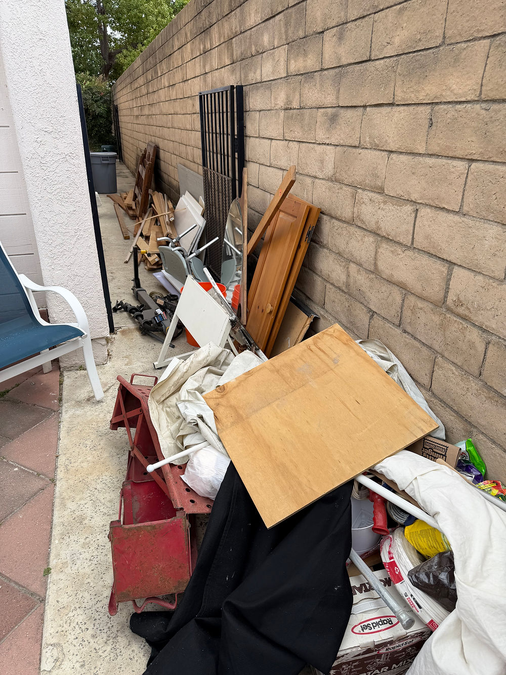 Before photo of miscellaneous debris prior to junk removal service.