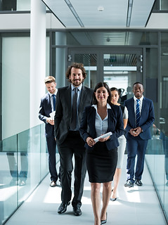 businesswoman-walking-with-colleagues.jpg