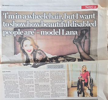 Newspaper feature titled "My wheelchair won't stop me from modelling", showing Lana striking a bold fashion pose in a wheelchair during a fashion photoshoot.