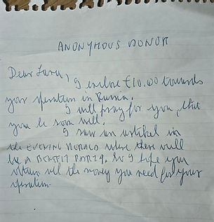 Handwritten note from an anonymous donor who contributed €10 and wished Lana a successful brain operation and recovery.