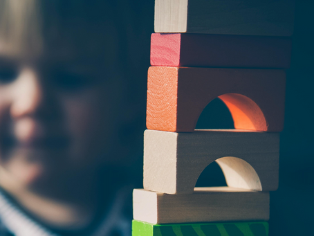child with building blocks