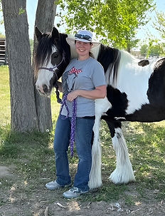 beautiful horse and her owner posing for picture