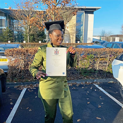 Josephine holding her certificate_edited.jpg