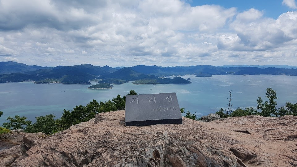 Peak overlooking sea and clouds