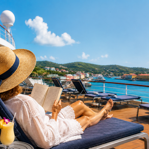 Woman relaxing with a book on a cruise ship deck while the ship is in port.