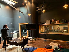 Joshua recordinga sample session at Remote Control Productions