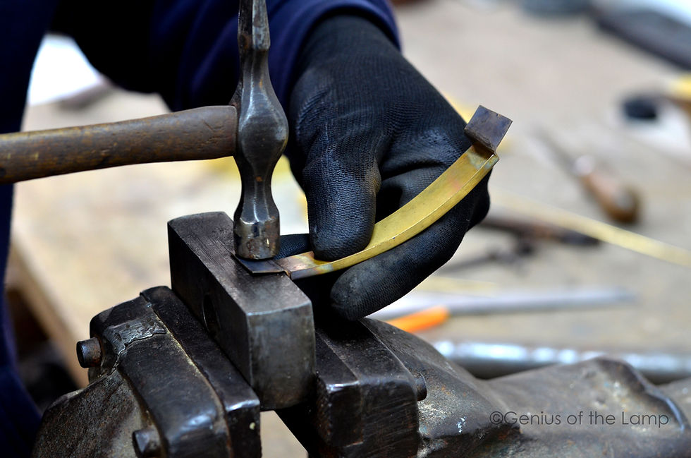 hammering brass sheet to shape