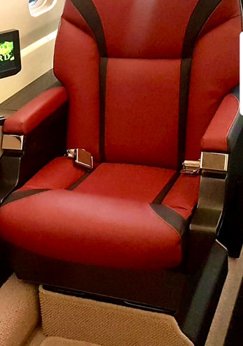 red seat with chromed buckles