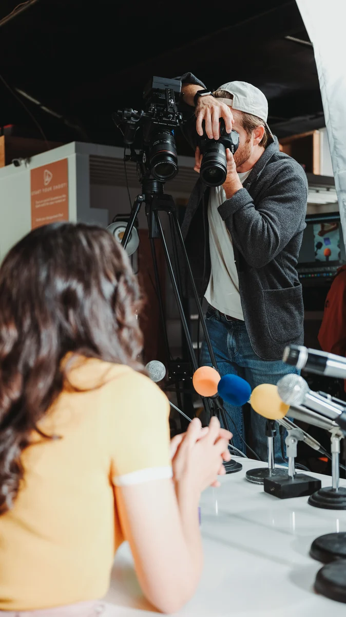 Cameraman Capturing Photos