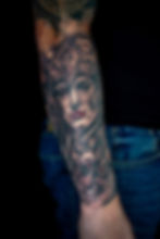 Realistic black and grey tattoo of Valkyrie, by Dagga