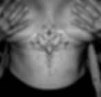 Lotus flower sternum tattoo, by Dagga