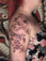 Peonies tattooed on a shoulder, by Dagga