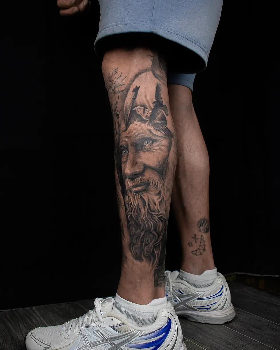 Realistic black and grey Viking warrior portrait calf tattoo, by Domi